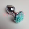 Gebruikte buttplug met groen roosje
