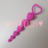 Anal beads met roze hart gebruikt